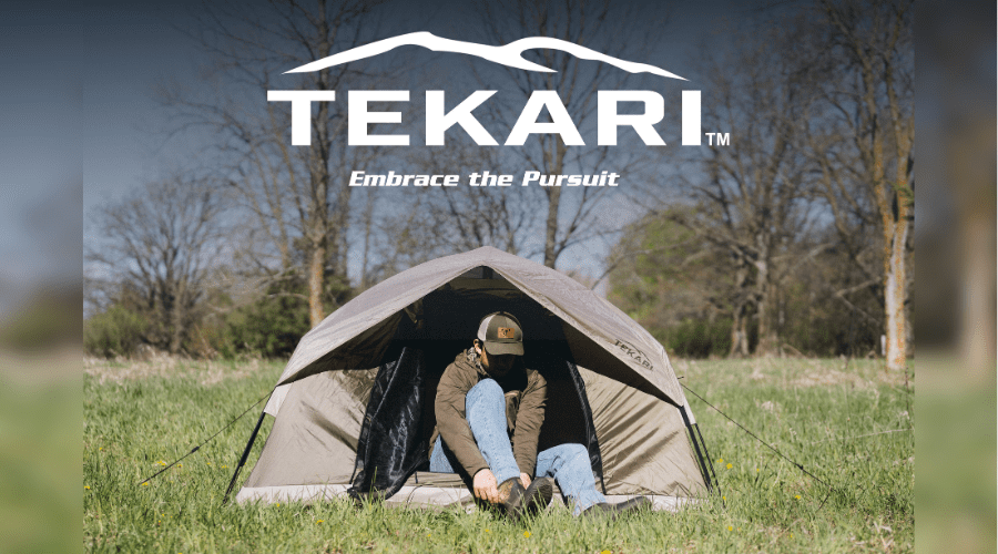 Outdoor camping setup with Tekari instant tents and insulated sleeping bags from TrueTimber displayed in a forest campsite.
